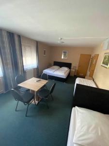 Postel nebo postele na pokoji v ubytování Hotel-Gasthof "Alter Ritter"