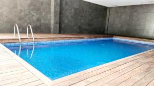 The swimming pool at or close to Forum-CCIB-Relax Flats