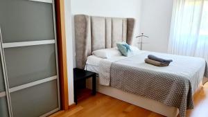 Posteľ alebo postele v izbe v ubytovaní Forum-CCIB-Relax Flats