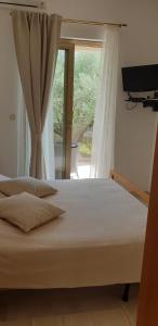 Postel nebo postele na pokoji v ubytování Apartments Cocaletto5