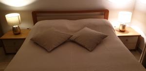 Postel nebo postele na pokoji v ubytování Apartments Cocaletto5