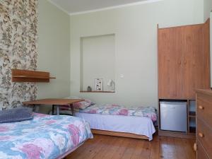Ένα ή περισσότερα κρεβάτια σε δωμάτιο στο Łodzianka