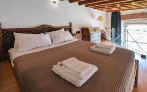Cama o camas de una habitación en Duomo Cathedral View - Luxury Apartment
