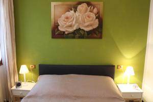 A bed or beds in a room at Heike Még 31 kép