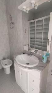 A bathroom at Mi morena cala llobeta 35