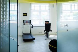 Posilňovňa alebo fitness centrum v ubytovaní Hotel Savoy