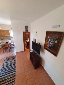 A television and/or entertainment centre at Stoupa Mani Tower