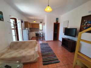 A kitchen or kitchenette at Stoupa Mani Tower
