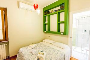 Postel nebo postele na pokoji v ubytování B&B Tiffany