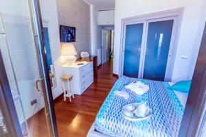 Postel nebo postele na pokoji v ubytování B&B Tiffany