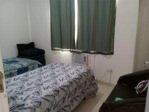 Ένα ή περισσότερα κρεβάτια σε δωμάτιο στο Apt Campo Grande/Res. Árvores4-Prox. Park Shopping