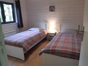 Postel nebo postele na pokoji v ubytování Gîte avec SPA privé près zoo Beauval et châteaux