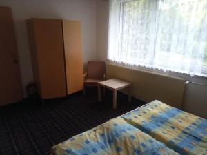 Postel nebo postele na pokoji v ubytování Penzion Chata Na Mlýně