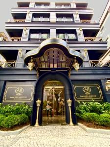 a store front of a blue building with a staircase at A11 HOTEL Exclusive in Istanbul