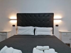 Posteľ alebo postele v izbe v ubytovaní B&B Il Viaggiatore