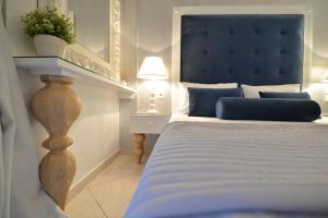 Posteľ alebo postele v izbe v ubytovaní Epavlis Luxury apts