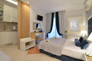 Posteľ alebo postele v izbe v ubytovaní Epavlis Luxury apts