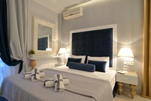 Posteľ alebo postele v izbe v ubytovaní Epavlis Luxury apts