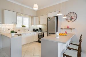 Kuchyň nebo kuchyňský kout v ubytování Luna Apartments