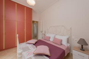 Postel nebo postele na pokoji v ubytování Luna Apartments