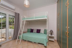 Postel nebo postele na pokoji v ubytování Luna Apartments
