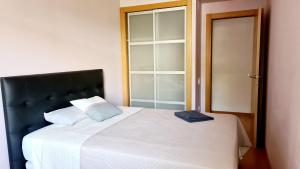Posteľ alebo postele v izbe v ubytovaní Forum-CCIB-Relax Flats