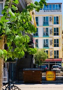 a bike parked in front of a building at Star Palace in Antalya