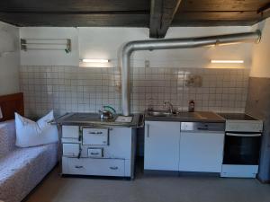 Kuchyňa alebo kuchynka v ubytovaní Ferienhaus Grofn