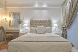 Posteľ alebo postele v izbe v ubytovaní Epavlis Luxury apts