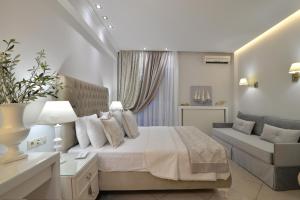 Posteľ alebo postele v izbe v ubytovaní Epavlis Luxury apts
