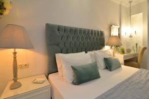 Posteľ alebo postele v izbe v ubytovaní Epavlis Luxury apts