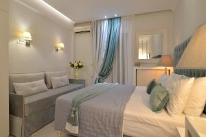 Posteľ alebo postele v izbe v ubytovaní Epavlis Luxury apts