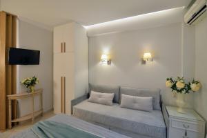 Posteľ alebo postele v izbe v ubytovaní Epavlis Luxury apts