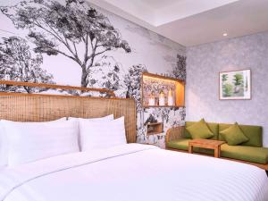 Postelja oz. postelje v sobi nastanitve Mercure Tangerang BSD City
