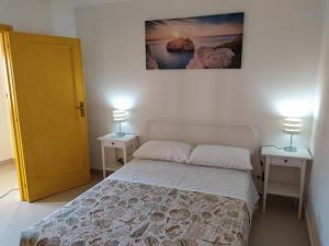 Voodi või voodid majutusasutuse Lo Spicchio b&b toas