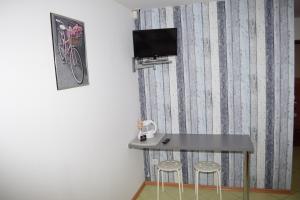 Telewizja i/lub zestaw kina domowego w obiekcie Pokoje Emilia I Julia