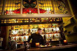 The lounge or bar area at McMenamins Hotel Oregon