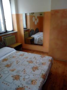 Postel nebo postele na pokoji v ubytování Albergo Bar Brenve