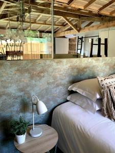 Cama ou camas em um quarto em Villa Margaridi