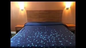 Postel nebo postele na pokoji v ubytování Skyview Motor Inn + 11 fotografií