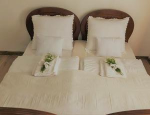 Postel nebo postele na pokoji v ubytování Borbély Vendégház