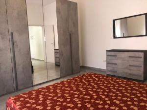 Postel nebo postele na pokoji v ubytování Hotel Est Piombino