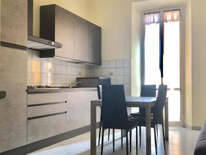 Kuchyň nebo kuchyňský kout v ubytování Hotel Est Piombino