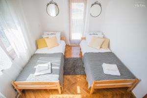 Posteľ alebo postele v izbe v ubytovaní Vila Ema + 37 fotografií