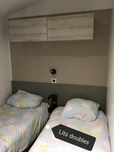 Katil atau katil-katil dalam bilik di Mobilhome LAME