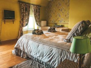 Postel nebo postele na pokoji v ubytování Hoeve Westdijk