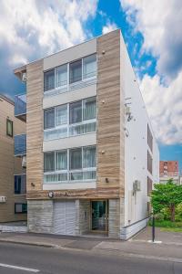 a building on a city street with at VILLA KOSHIDO KOTONI annex in Sapporo
