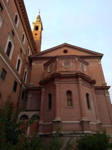 a building with a clock tower on top of it at Casa S. Giuseppe di Cluny in Rome
