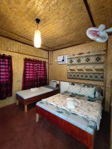 Postel nebo postele na pokoji v ubytování Purple Homestay Hillside