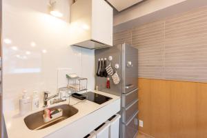 Kuchyň nebo kuchyňský kout v ubytování plat hostel keikyu asakusa station
